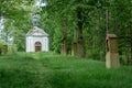 Small Christian Holy Trinity Chapel with Stations of the Cross along the pathway in front of it in Brtniky, Bohemian Switzerland, Royalty Free Stock Photo