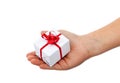 Small christmas gift in child hand Royalty Free Stock Photo