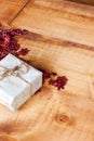Small christmas Handmade gift boxes on wooden background . Royalty Free Stock Photo