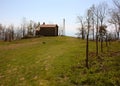 Small church abandoned, in disuse, on the Apuan Alps of the Tuscan Apennines in a clearing on a sunny spring day Royalty Free Stock Photo