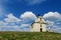 Small church on a green hill Royalty Free Stock Photo