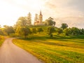 Small church in the middle of lush green spring landscape on sunny day. St. Peter and Pauls church at Bysicky near Lazne Royalty Free Stock Photo