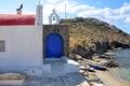 Small church right on beach of greek island Mykonos Royalty Free Stock Photo