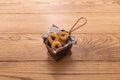 Small churros with sugar in copper-plated metal basket