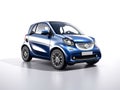 Small city blue mini car Smart Fortwo isolated on white background. front view Royalty Free Stock Photo