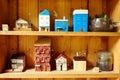 Small clay house model in woodshelf interior decorate Royalty Free Stock Photo