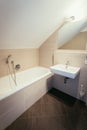 Small clean modern bathroom in an apartment