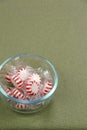 Small Clear Glass Bowl with Clear Wrapped Peppermint Candies Royalty Free Stock Photo