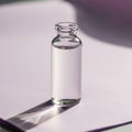 A small, clear glass vial stands Royalty Free Stock Photo