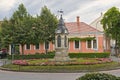 small clock tower on a roundabout in Sopron