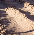 Small close-up dunes of wet sand. background, nature.