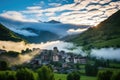 small, cloud-kissed mountain village at sunrise