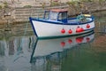 A Small Coastal Fishing Boat Moored in Harbour Royalty Free Stock Photo