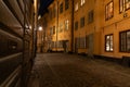 Small cobbled street in the old town of Stockholm, Sweden at night Royalty Free Stock Photo