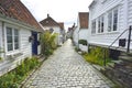 Traditional cobblestone street with wooden houses in the old town of Stavanger, Norway