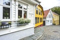 Traditional cobblestone street with wooden houses in the old town of Stavanger, Norway