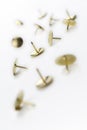 A Small Collection of Thumbtacks In A White Box - Crooked Angle #1