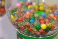Small colored balls in a coin vending machine in the mall Royalty Free Stock Photo