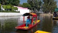 Small, colorful food boat at Xochimilco