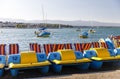 Small colorful boat on shore