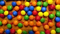 Small colorful chocolates on the roof of a homemade gingerbread house