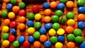 Small colorful chocolates on the roof of a homemade gingerbread house