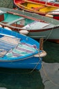 Small colorful fisherman boats park at the pier in Manarola town, Cinque terre, Italy Royalty Free Stock Photo