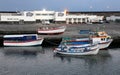 Small colorful fishing boats moored in the fishing port in the harbor, Ponta Delgada, Sao Miguel, Azores, Portugal Royalty Free Stock Photo