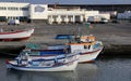 Fishing boats moored at the pier of the fishing port in the harbor, Ponta Delgada, Sao Miguel, Azores, Portugal Royalty Free Stock Photo