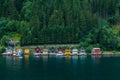 Small colorful houses on the coast of a fjord in Norway Royalty Free Stock Photo