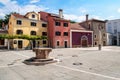 Small colorful houses and a cobbled square in the port city of Koper in Slovenia. Royalty Free Stock Photo