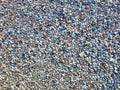 Small colorful mosaic floor tiles and texture. Stone gravel background texture. Small multicolored pebble-stones. Stones on the Royalty Free Stock Photo