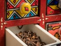 Small painted box with drawers for spices, open drawer Royalty Free Stock Photo