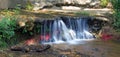 Small colorful waterfall in Spain