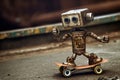 Small, comical robot expertly maneuvering on a skateboard representing the sheer joy and lightheartedness of a robot embracing the Royalty Free Stock Photo