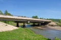 A small concrete bridge over the river. Royalty Free Stock Photo
