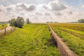 Small concrete wall on top of a dyke Royalty Free Stock Photo