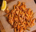 Small cooked shrimp on wooden tray Royalty Free Stock Photo