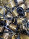 Small copper coils on plastic spools ready to be recycled Royalty Free Stock Photo