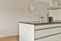 A small corner kitchen in white tones Royalty Free Stock Photo