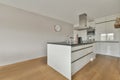 A small corner kitchen in white tones Royalty Free Stock Photo
