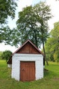 Small cosy white brick warehouse in the forest Royalty Free Stock Photo