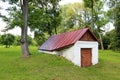 Small cosy white brick warehouse in the forest Royalty Free Stock Photo