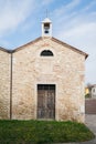 Small country church with adjoining bell tower with a single bell Royalty Free Stock Photo