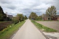 Small country road named Knibbelweg in the lowest polder of western Europe in Zevenhuizen, the Netherlands