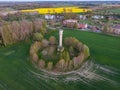 Small countryside city view of fields and old soviet water tower