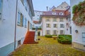 The small courtyard with small ornamental garden in historical part of Basel, Switzerland