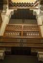 Small courtyard serving the student dormitories with wood carving in madrasa Ben Youssef Madrasa in Marrakesh, Morocco Royalty Free Stock Photo