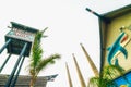 Small Cozy Beach Restaurant Rooftop and Three Power Plant on Morro Bay, California. Royalty Free Stock Photo