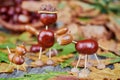 Small creatures made of chestnuts and acorns Royalty Free Stock Photo